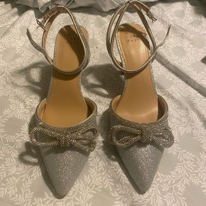 Silver bow heels